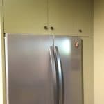 A panel was added to hide the side of the refrigerator giving the space a nice clean look. 